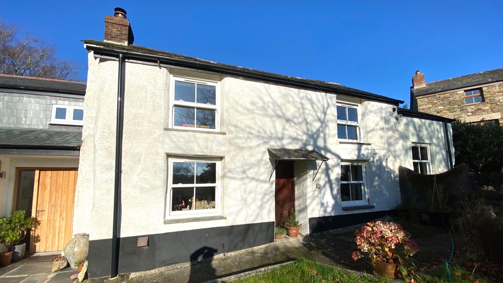Lime Rendering and Lime Pointing Cob Cottage Cornwall