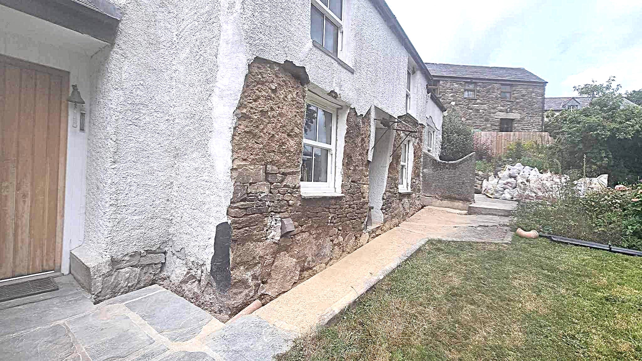 Lime Rendering and Lime Pointing Cob Cottage Cornwall