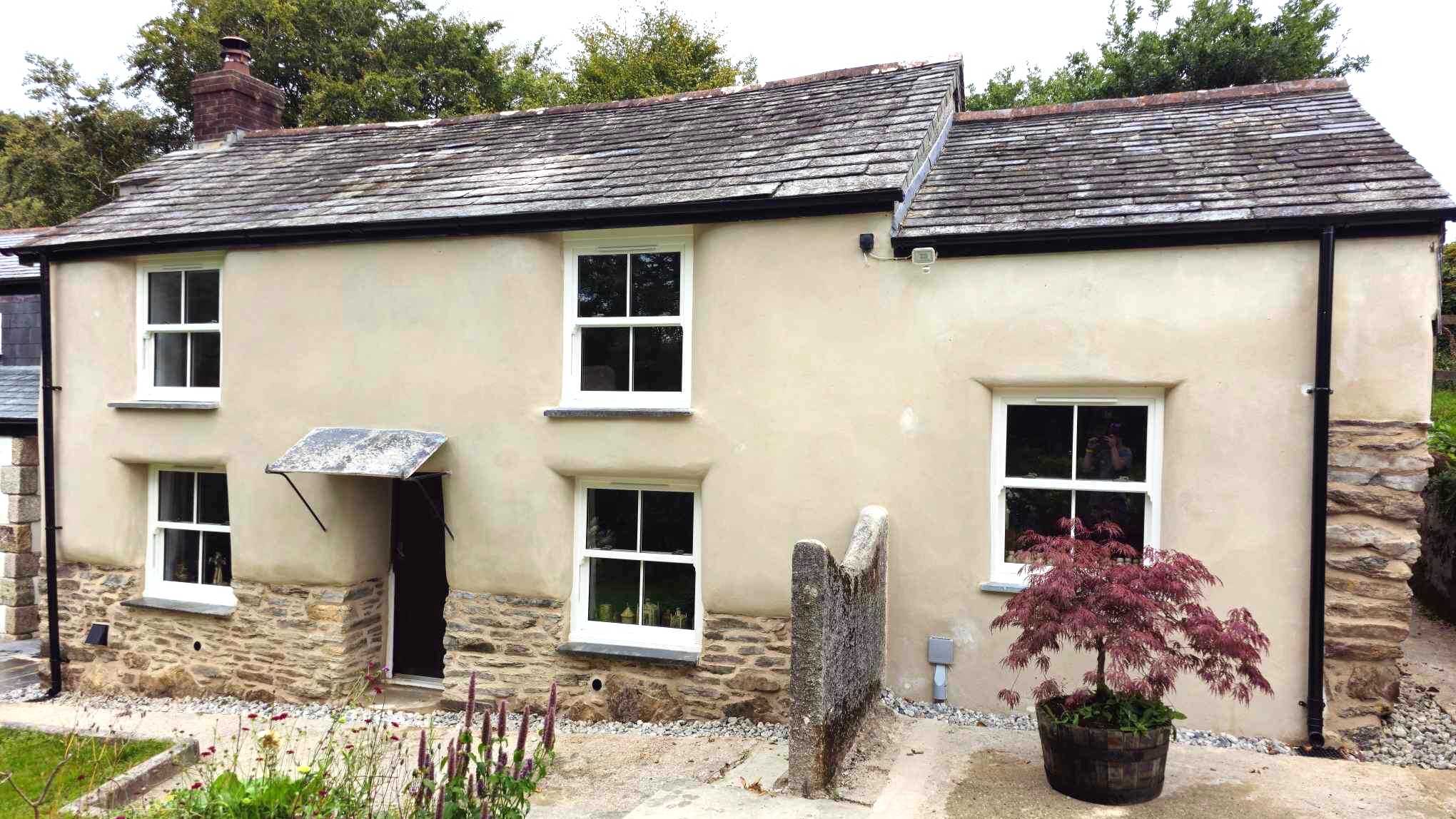 Lime Rendering and Lime Pointing Cob Cottage Cornwall