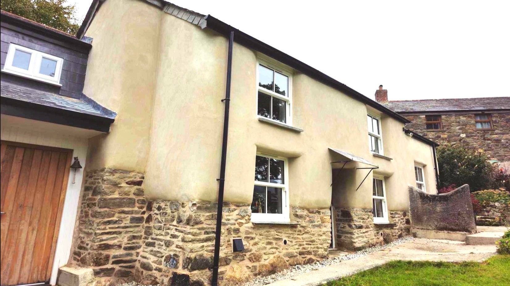 Lime Rendering and Lime Pointing Cob Cottage Cornwall