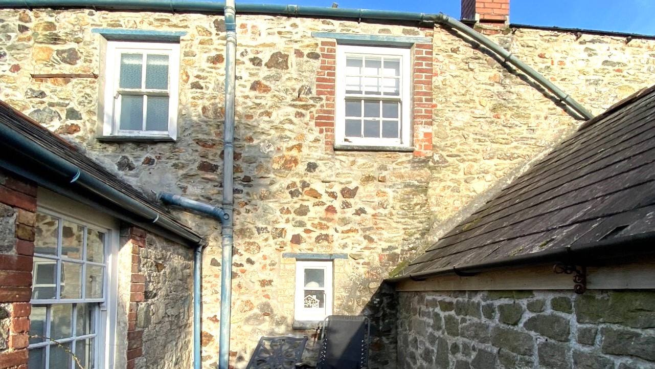 Lime Rendering and Lime Pointing Cob Cottage Cornwall
